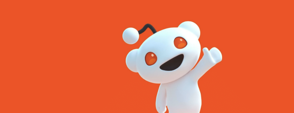 Le personnage de Reddit sur fond orange